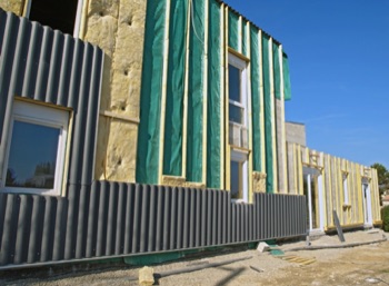 Pose d'un bardage bois autour de Bourges (18) dans le Cher